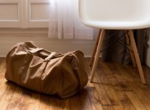 Duffel bag on floor