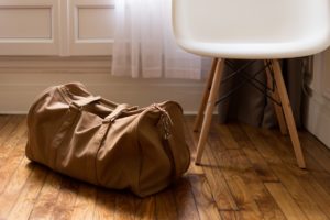 Duffel bag on floor